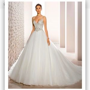 Stunning ball gown with v-neckline, low back and chapel length. Size 12
